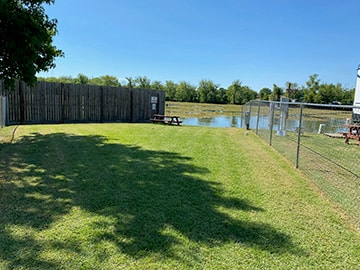 Fishing area with fenced dog park at Venice On The Lake